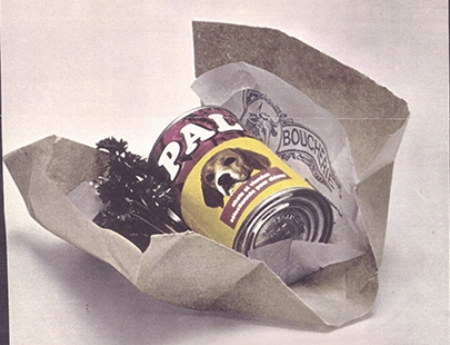 A can of PAL® food for dogs wrapped in paper
