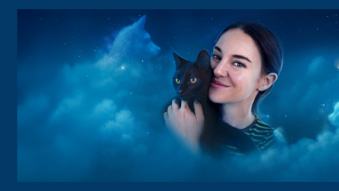 Woman in night sky clouds with black cat